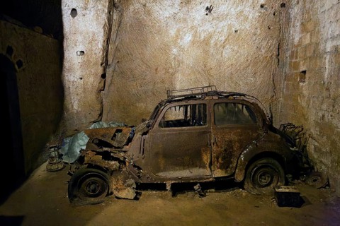 Rotten Lancia Aurelia from the 1950s, car cemetery, Galleria Borbonica, Bourbon Tunnel, underground