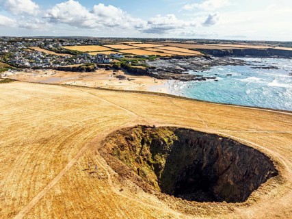 Top Down View of Trevone Round Hole over Trevone Bay from a drone, Trevone, Padstow, Cornwall,