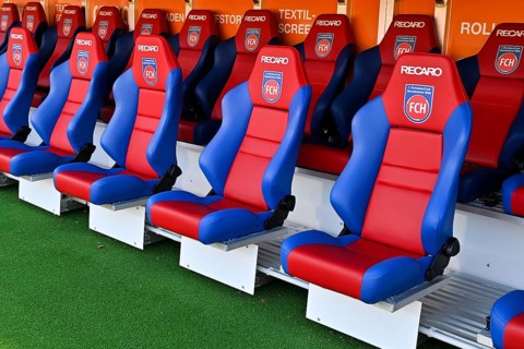 Heated seats on the coaching bench, backup bench, empty, Recaro, logo, soccer, Bundesliga, rain,