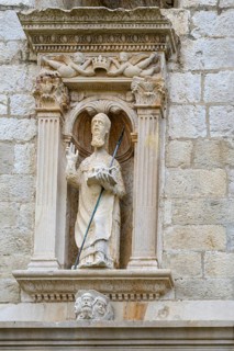 St. Blaise, the patron saint of Dubrovnik, holding a model of the city and standing within a