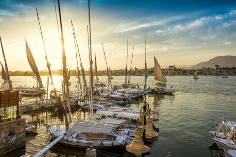 Sailing ships, feluks on the Nile, sunset, Luxor, Egypt