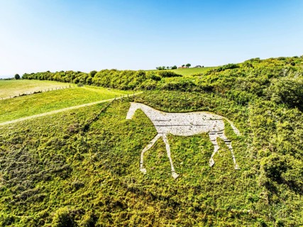 Litlington White Horse over Cuckmere Valley from a drone, Hindover Hill, South Downs, East Sussex,