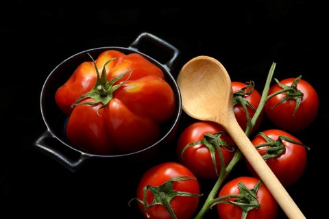 Oxheart tomato in pots and vine tomatoes, Solanum lycopersicum