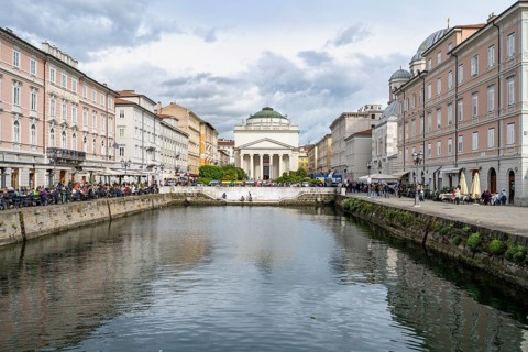 Grand Canal with restaurants, Sant'Antonio Taumaturgo church in the back, Borgo Teresiano, Trieste,