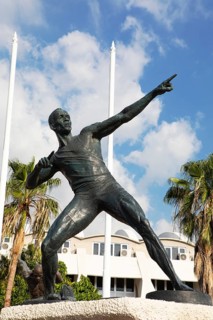 Usain Bolt statue at National Stadium, Kingston, Kingston Parish, Jamaica, West Indies, Caribbean,