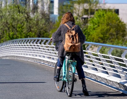 Pedestrians and cyclists on Kronzprinzenbrücke, Regierungsviertel Berlin, Germany