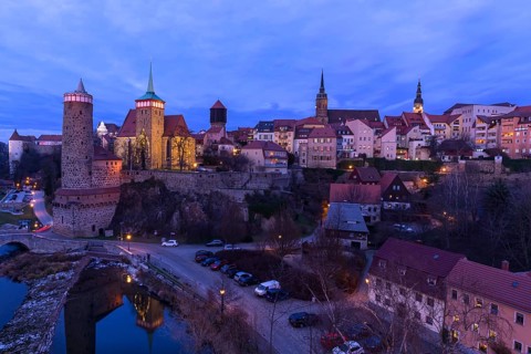 View of the old town with towers and city wall at dusk, Bautzen, Upper Lusatia, Saxony, Germany