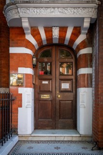 Elaborately designed house entrance, Victorian brick town house, Cadogan Gardens, Relais & Chateau