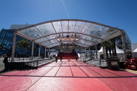 Staff preparing for the Red Carpet in front of the opening of the 79th Cannes International Film