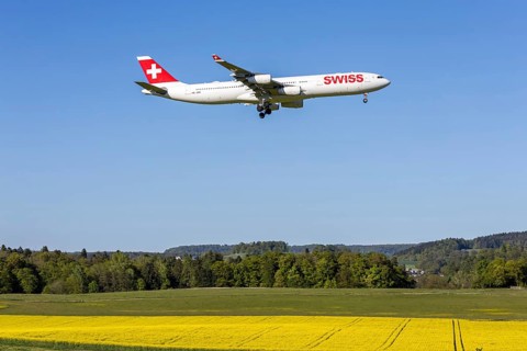 A Swiss Airbus A340-300 aircraft with the HB-JMB license plate at Zurich Airport, Switzerland