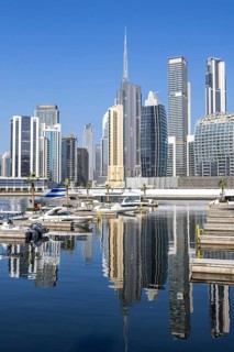 Downtown Dubai skyscrapers with Burj Khalifa skyline on the Marasi Bay Business Bay Canal in Dubai,