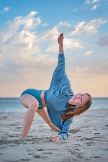 Scene featuring a young woman, camatkarasana, wild thing pose, a woman, yoga, yoga asana, and