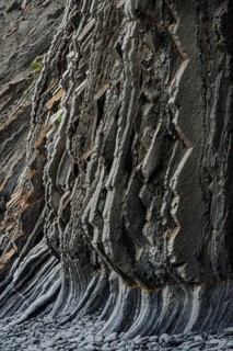 Geological formation of sandstone and limestone layers, Flysch on Itzurun Beach in Zumaia, Spain