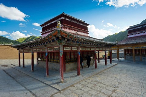 Prayer wheels on the Kora, Labrang Tibetan Buddhist Monastery circular route, Xiahe, in Gannan