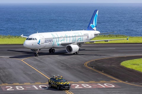 An Azores Airlines Airbus A320 aircraft with the license plate CS-TKQ at Horta Airport, Portugal