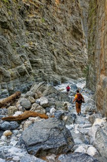 Hiker in the Samaria Gorge, tourist highlight, hiking, wildly romantic, landscape, Greek island,