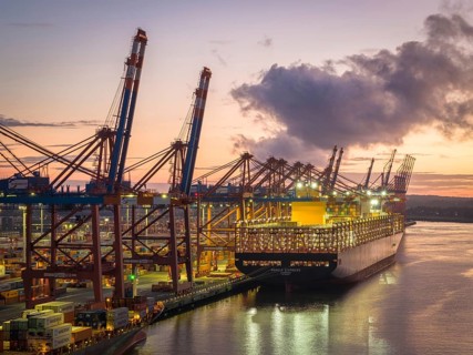 Aerial view at Waltershof harbour during the Blue Hour at the berths of Eurogate Container Terminal