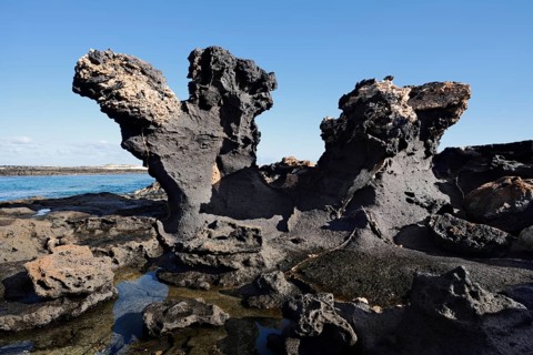 Lava rocks on the coast, El Cotillo, Fuerteventura, Canary Islands, Spain