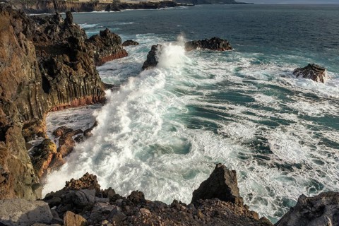 Sea, lava rocks and coast at Playa Charco Verde. La Palma, Canary Islands, Spain
