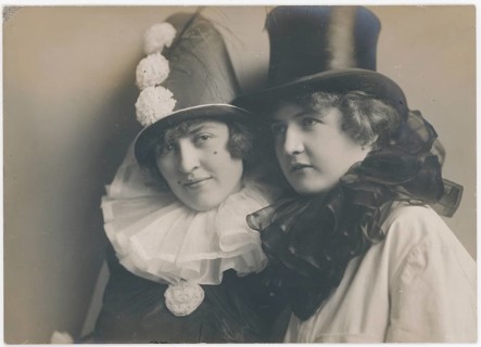 Mardi Gras, Women with Top Ties and Pierrot Hat, Two Women in Chic Costumes and Hats in a Friendly