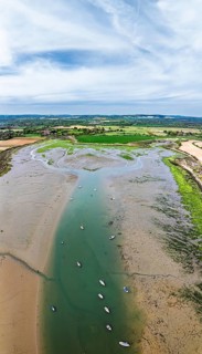Panorama of Fields and Farms over Bosham Quay from a drone, Chichester Harbour National Landscape,