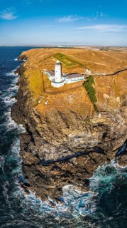 Panorama of Cliffs and Trevose Head Lighthouse from a drone, Padstow, Cornwall, England, United