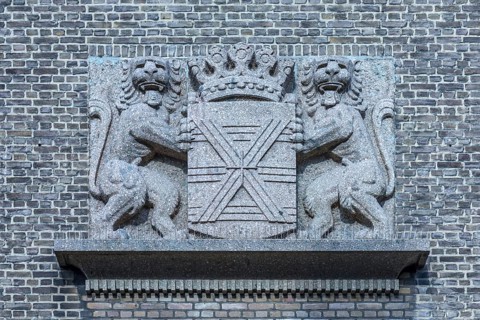 City coat of arms at the town hall designed as relief, Enschede, Netherlands