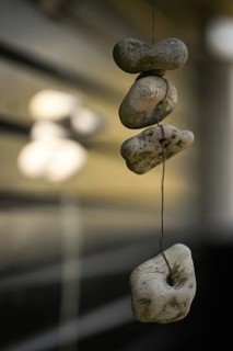 Mobile made of bricks connected with wire, Houvig, North Sea, Denmark