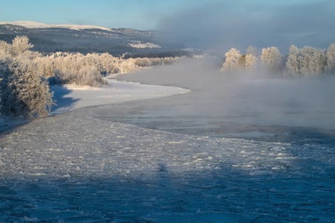 Fog over the freezing river Glomma (Glåma), Alvdal, Hedmark, Innlandet, Norway, February 2026
