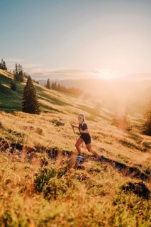 Summer trail running and hiking in the Alps on the Riedberg Pass between Obermaiselstein and