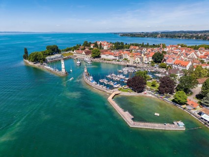 Aerial view of Lindau island in Lake Constance with the lighthouse and the Bavarian lions at the