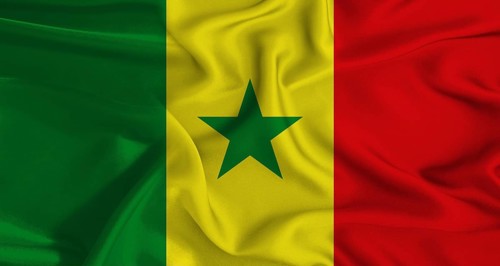 Colorful flag of Senegal with a silky fabric texture waving. Realistic Senegal flag waving
