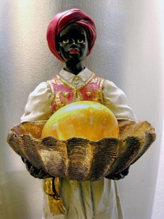 Figure of a black boy with a nanduei in a mussel, Nuremberg, Mittelfranlken, Bavaria, Germany
