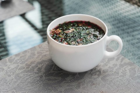 Cold beetroot soup, kholodnik, cold borscht, summer soup made of beets, herbs and eggs, popular in
