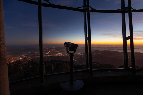 Glowing red sunrise over Mt. Wellington near Hobart in Tasmania, Australia