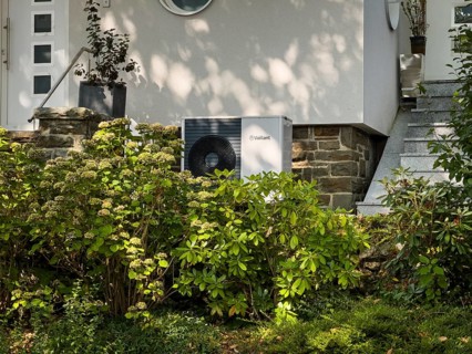 A heat pump in the front yard of a single-family house in Wuppertal, Germany