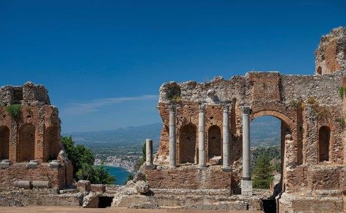 View of ancient theatre, the coast near Naxos and the Mediterranean Sea, Taormina, Sicily, Italy