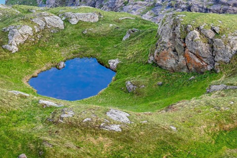 Mountain lake near the Pasterze glacier in the Hohe Tauern National Park, Heiligenblut, Carinthia,
