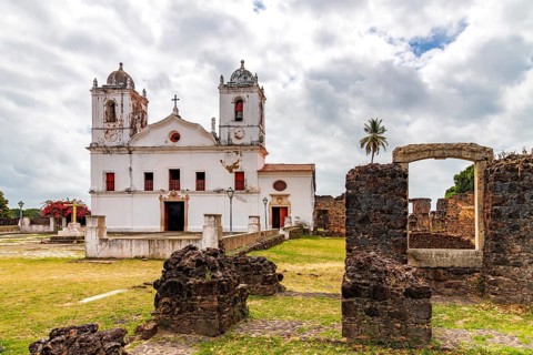 Historic church surrounded by stone ruins in the old city of Alcantara, Maranhao, Alcantara,