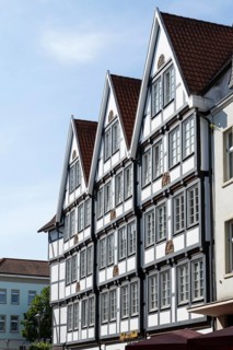 Several historic gabled houses side by side, half-timbered houses, pedestrian zone, Brüderstraße,