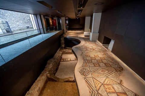 Floor mosaics with geometric patterns, mosaic floors from different periods one above the other,