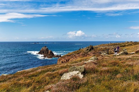 Coastline, heathland on the Atlantic coast, South West Coast Path coastal footpath, blue sky in