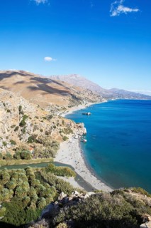 Preveli beach, palm beach on the Megalopotamos or Kourtaliotis river, in the back the Lefka Ori or