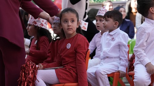 Children celebrate the 102nd anniversary of the Republic Day of Turkey, a national holiday