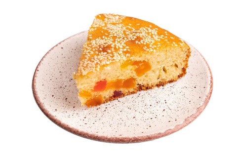 Pie with candied fruit isolated on white background, close up, side view