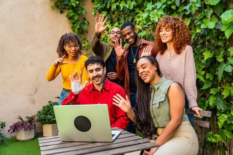 Diverse young people enjoying a virtual group therapy session or online support meeting, engaging
