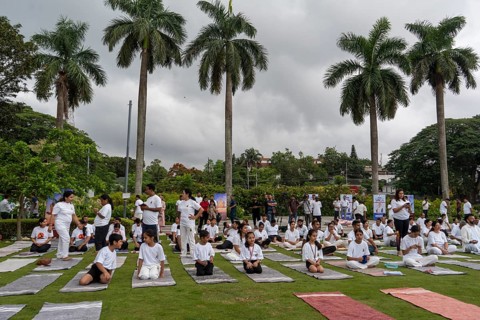 People participated in a mass yoga session organised on the occasion of International Day of Yoga,