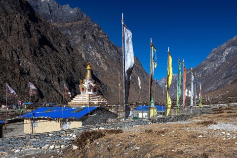 Buddhist stupa, including choirs with prayer flags, Tsum Valley, Himalayas, Nepal