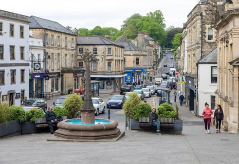 Traffic congestion line of vehicles in town centre, Market Place, Frome, Somerset, England, UK
