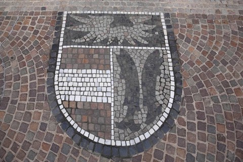 City coat of arms as monochrome floor mosaic, paving stones, grey, white, town hall, Kenzingen,